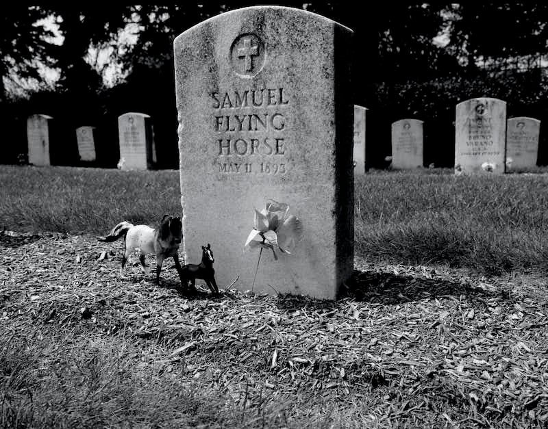 A tombstone of a young Oglala Lakota student buried at the old Carlisle Indian School cemetery. Andrew Lichtenstein/Corbis News Collection via Getty Images