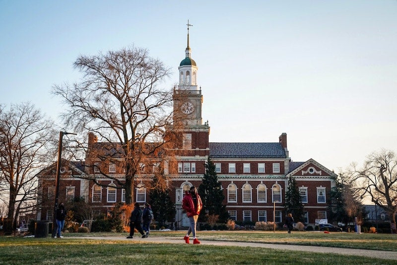Students walk on the campus of Howard University in Washington on Jan. 31, 2022.Sarah Silbiger / Reuters