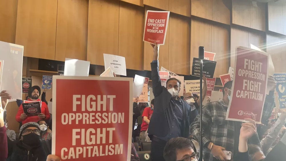fight oppression fight capitalismn banners protest