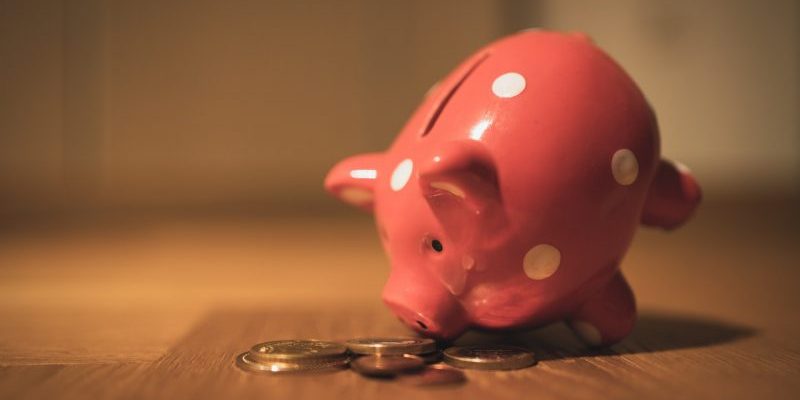 Piggy bank and coins