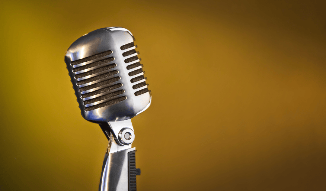 Microphone against a yellow shaded backdrop