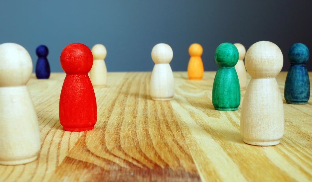 Multi-colored wooden figurines of people, Rice University Sociology RARE Workgroup
