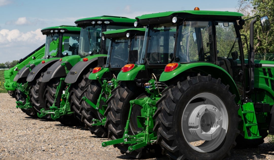 Row of tractors, Rice University Sociology RARE Workgroup