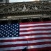 Citigroup estimates the U.S. economy lost $16 trillion over the past 20 years as a result of discrimination against African Americans. Above, the American flag hangs in front of the New York Stock Exchange on Sept. 21. Spencer Platt/Getty Images