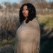 Nina Banks, who became president of the National Economic Association this week, has studied the work done by women that provided services to predominantly Black communities.Credit...Hannah Yoon for The New York Times