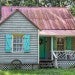 At this Gullah Geechee home on Daufuskie Island, South Carolina, painted doors and shutters keep out evil spirits called "haints." DAWNA MOORE / ALAMY
