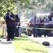 Houston Police investigate a fatal officer-involved shooting on Josie Street in Houston, on Wednesday, April 27, 2022. Jalen Randle was shot April 27 as he exited a vehicle. Police were trying to arrest the suspect, who had multiple felony warrants. (Elizabeth Conley/Houston Chronicle via AP)
