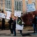 In this Nov. 12, 2021, file photo, people protest outside the offices of the New Mexico Public Education Department's office in Albuquerque, N.M. Cedar Attanasio/AP, FILE