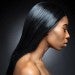 black woman side profile with long dark sleek hair
